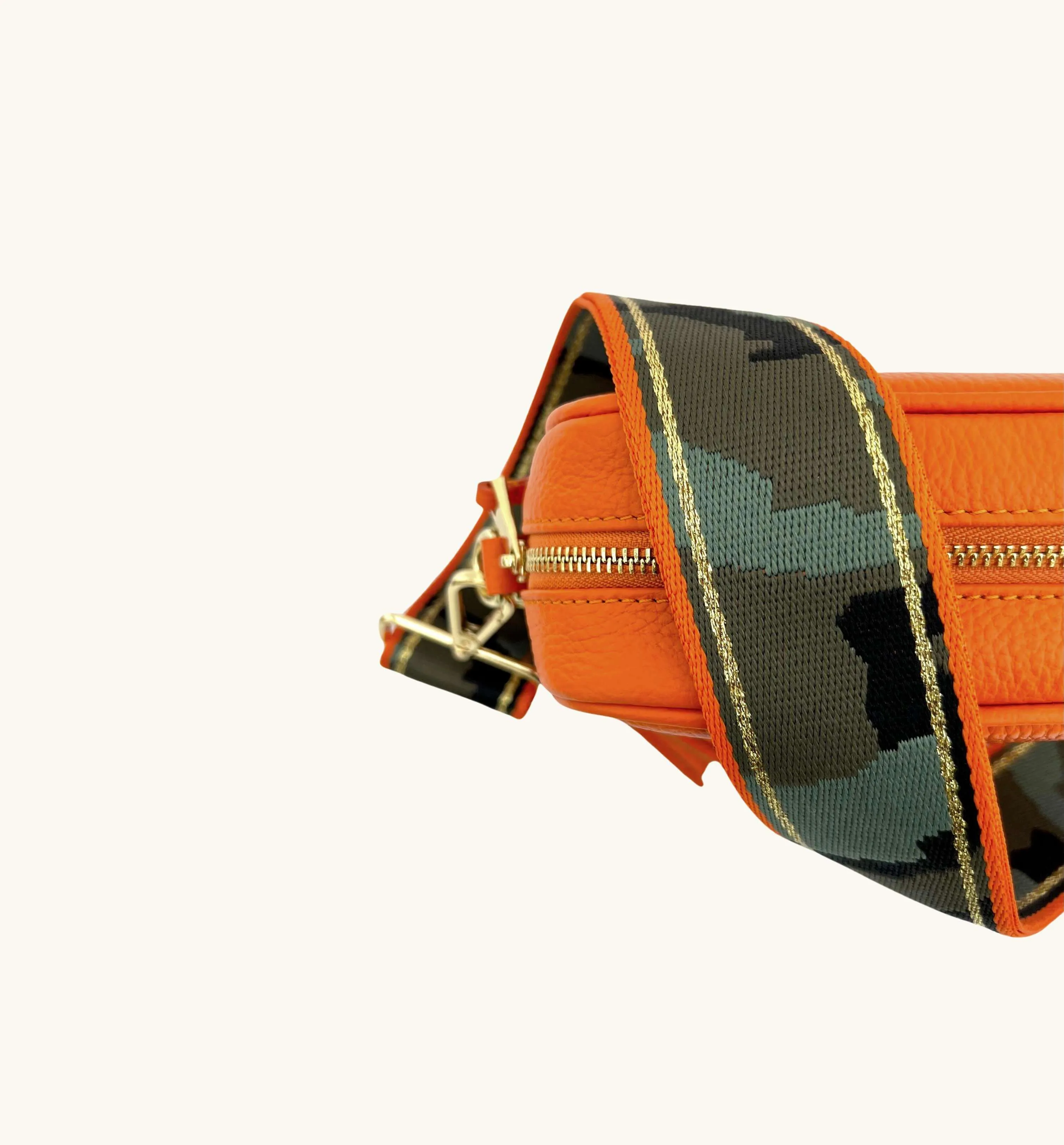 The Tassel Orange Leather Crossbody Bag With Orange & Gold Stripe Camo Strap