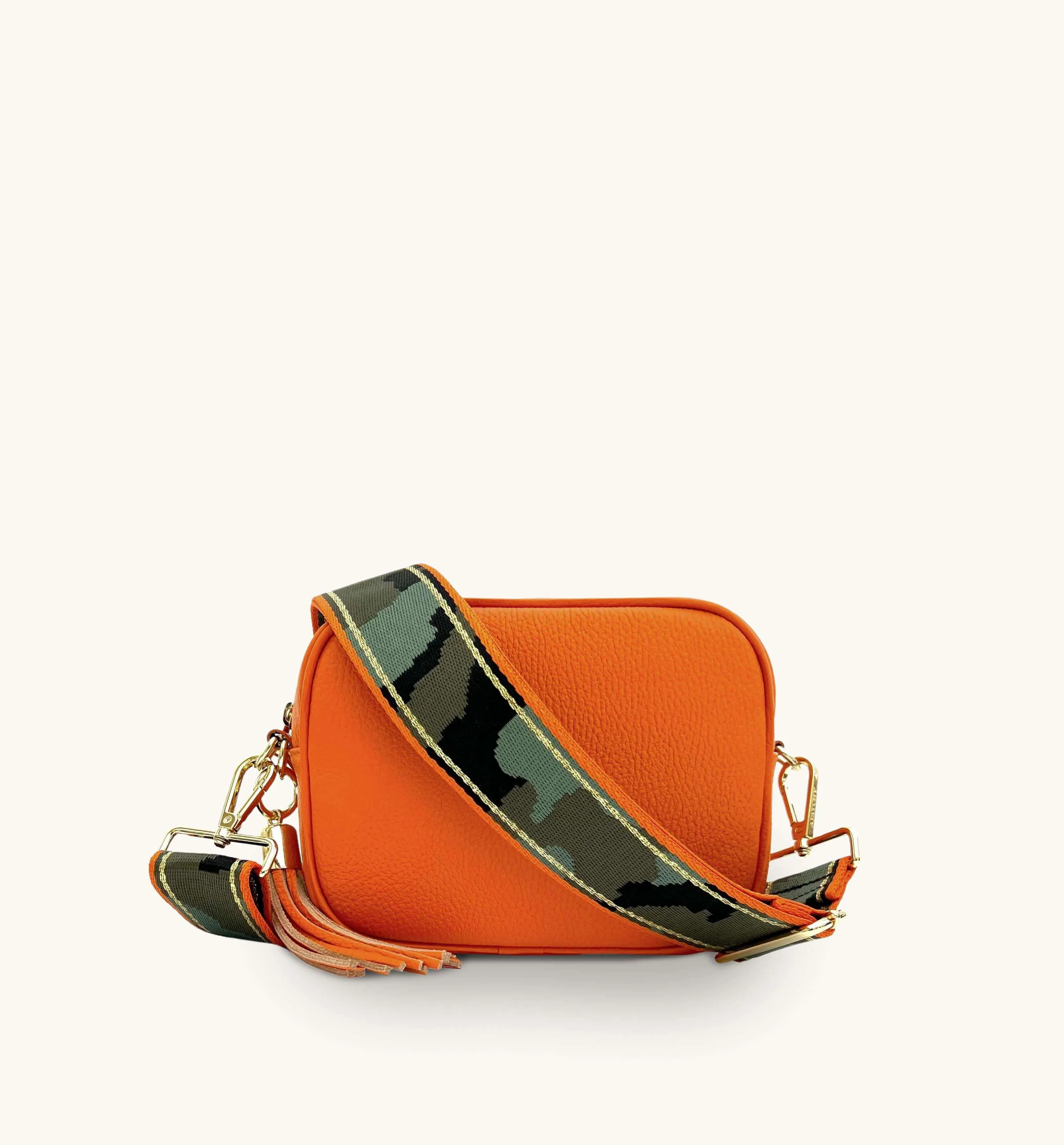 The Tassel Orange Leather Crossbody Bag With Orange & Gold Stripe Camo Strap