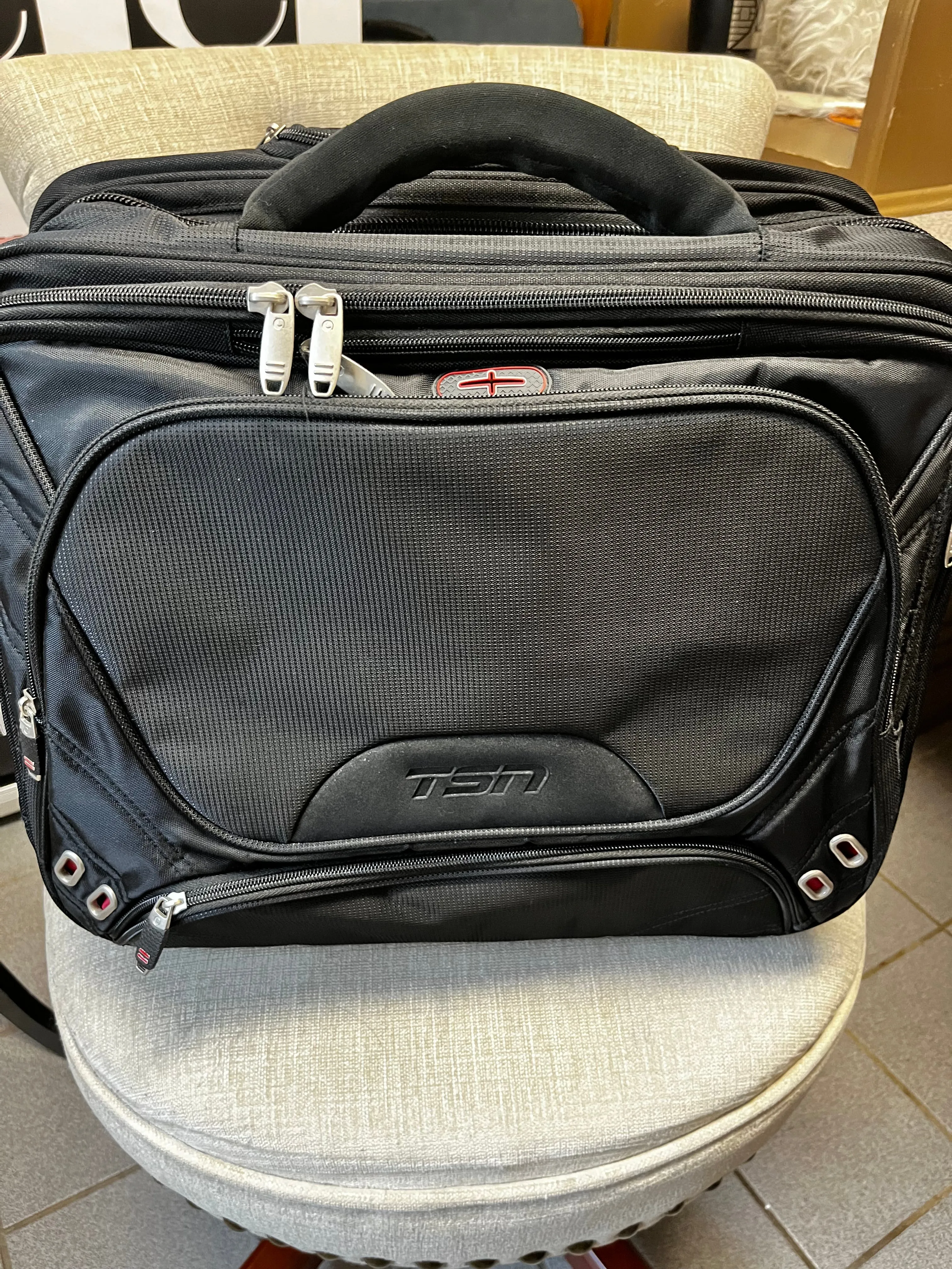 TSN Branded Wheeled Carry-On Suitcase NWOT