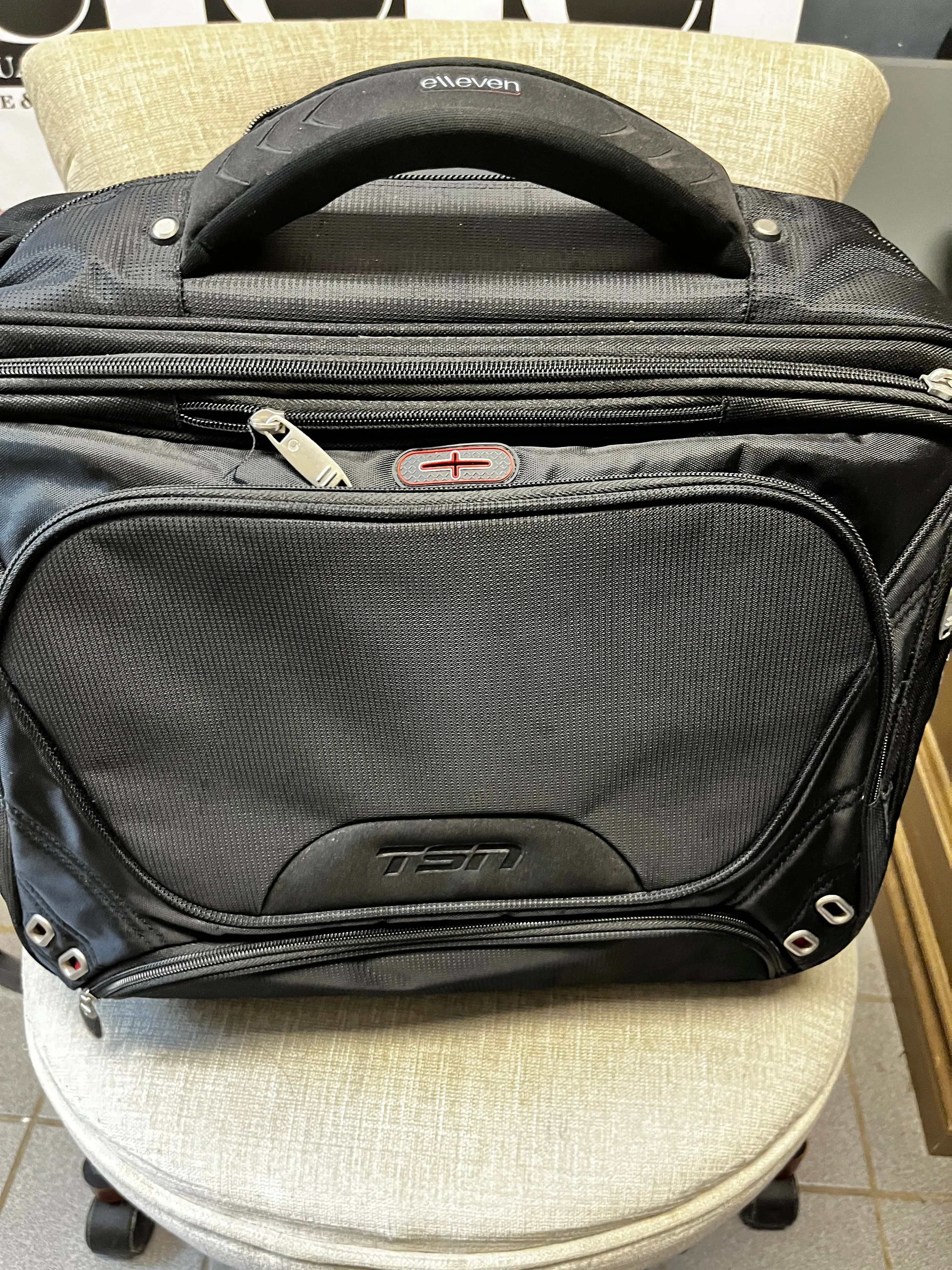 TSN Branded Wheeled Carry-On Suitcase NWOT