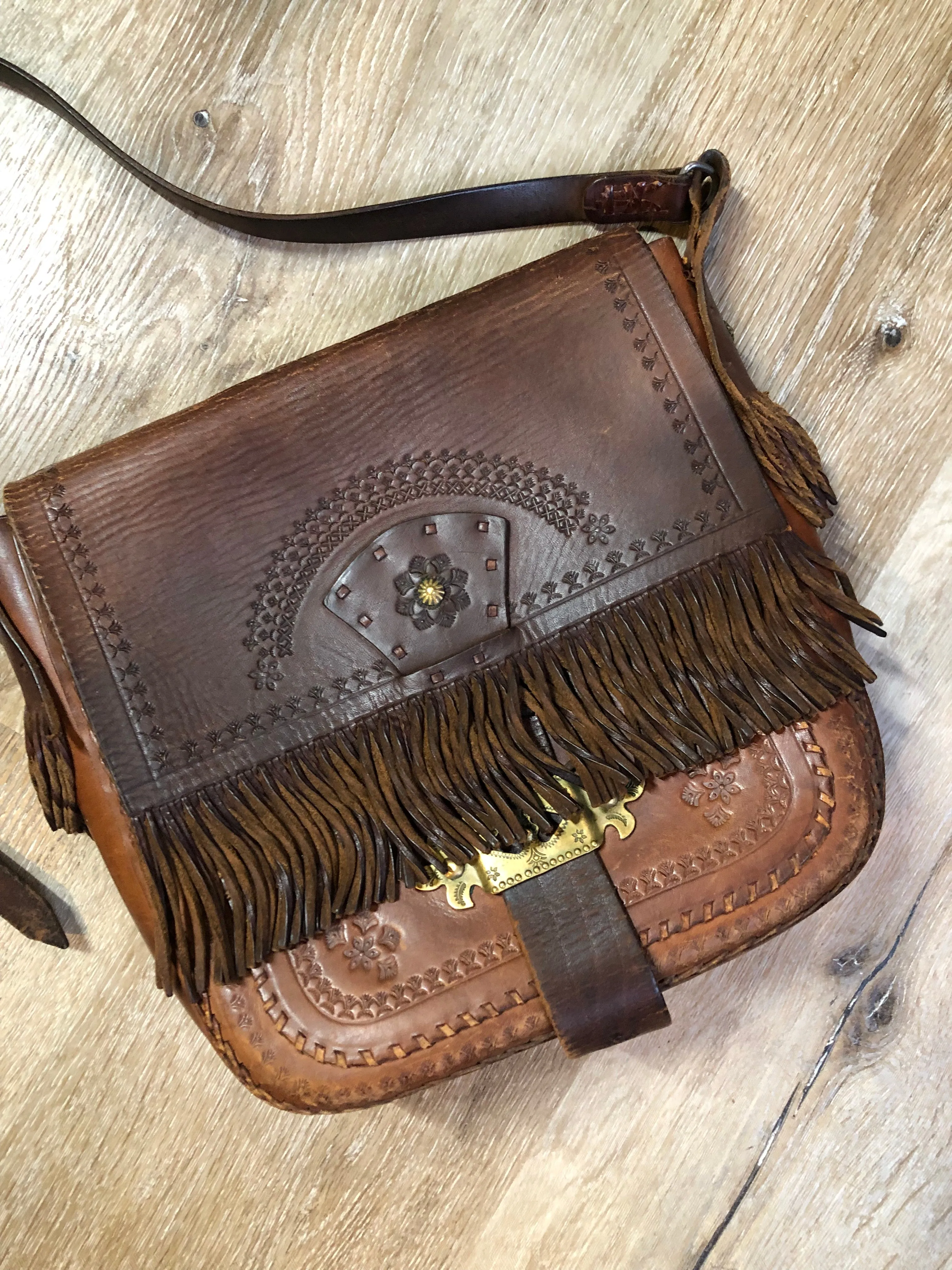 Vintage Leather Fringe Crossbody Bag with Hand Tooled Design