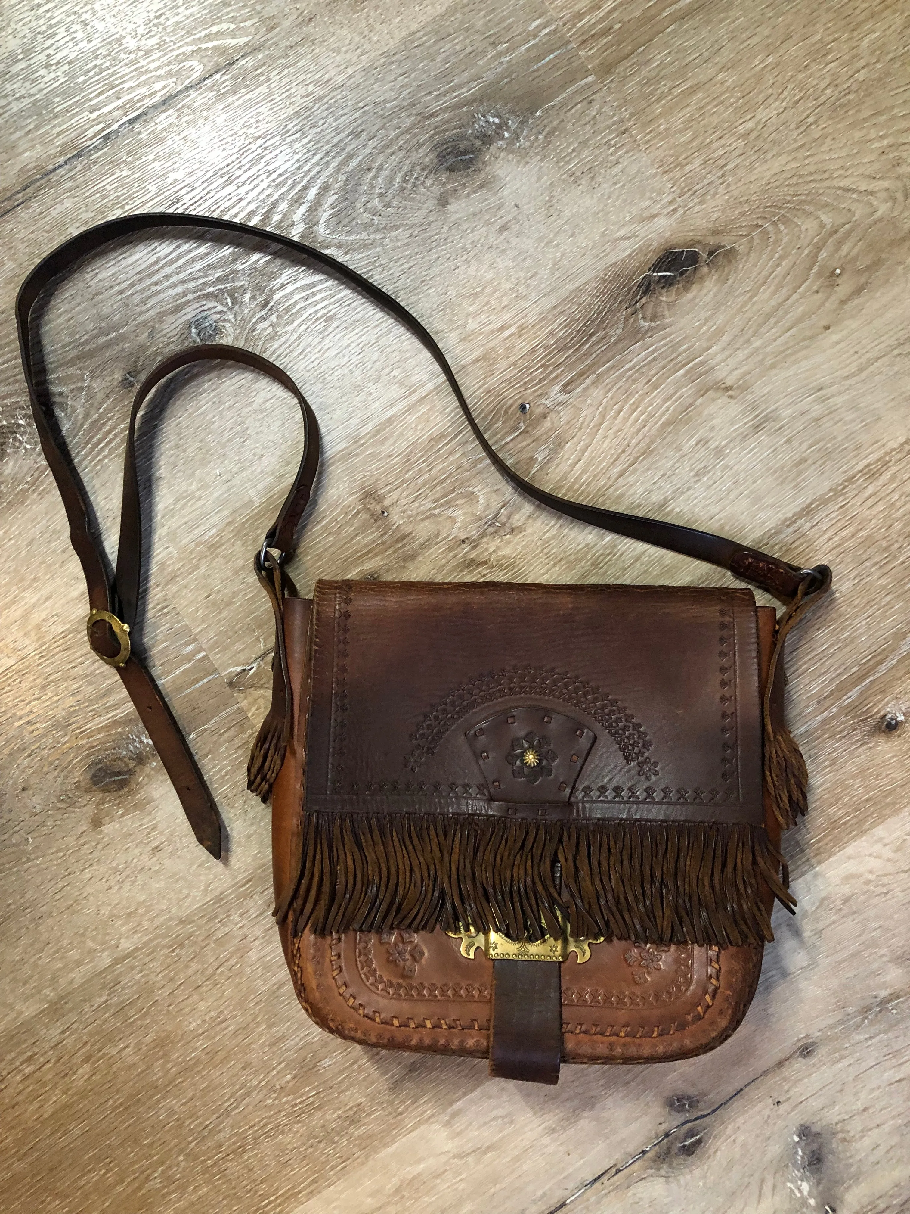 Vintage Leather Fringe Crossbody Bag with Hand Tooled Design